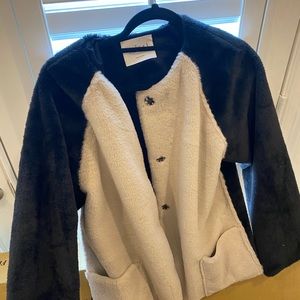 Black and cream fur jacket